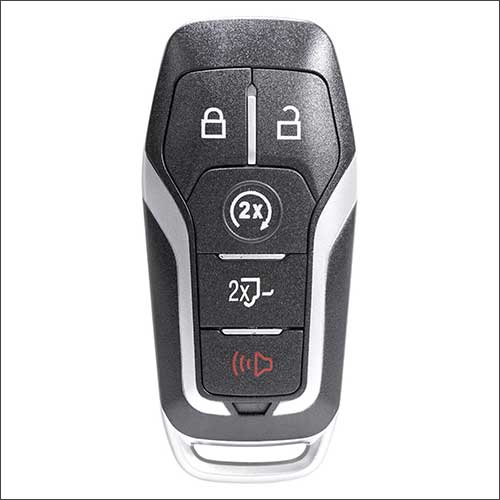 An image of a vehicle key fob for a Ford F-150 with automatically-lowering tailgate feature